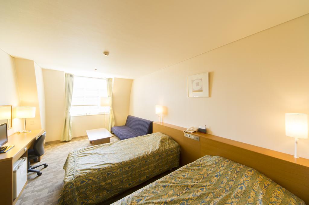 Hotel Hiroshima Sunplaza Rum bild